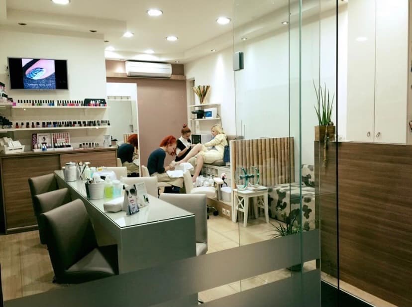 Salon interior with staff working